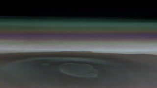 A cropped version of the team's panoramic Olympus Mons view. There are bright atmospheric lines above Mars.