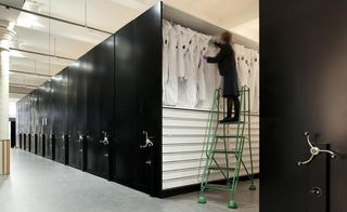 custom-built storage, featuring drawer and hanging space