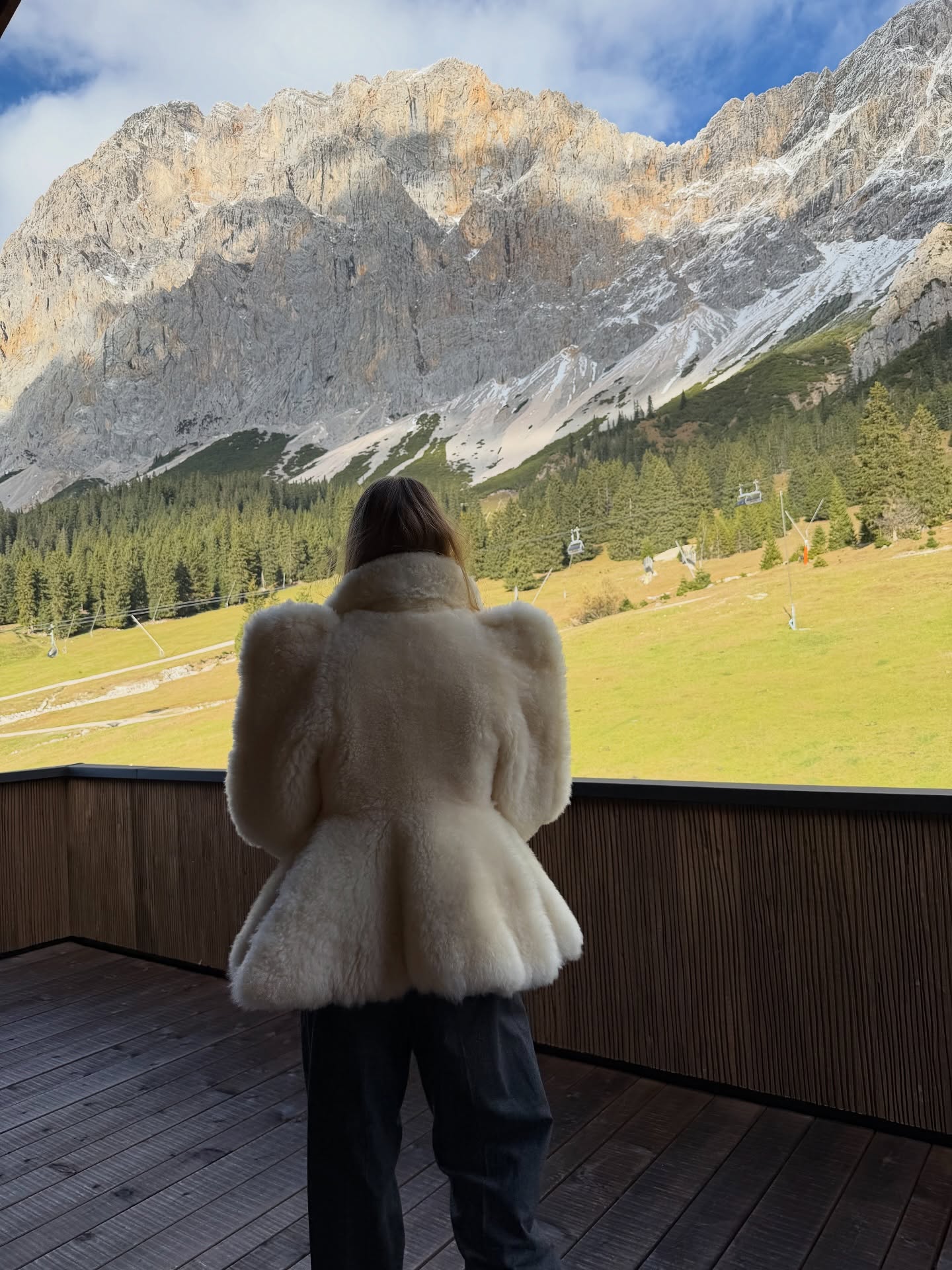 Rosie Huntington-Whiteley wears a white fur jacket in Austria