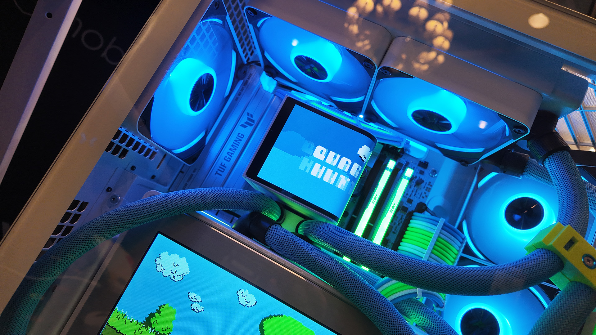 A custom liquid cooled gaming PC at the Pro Gamers Group booth at CES 2025.