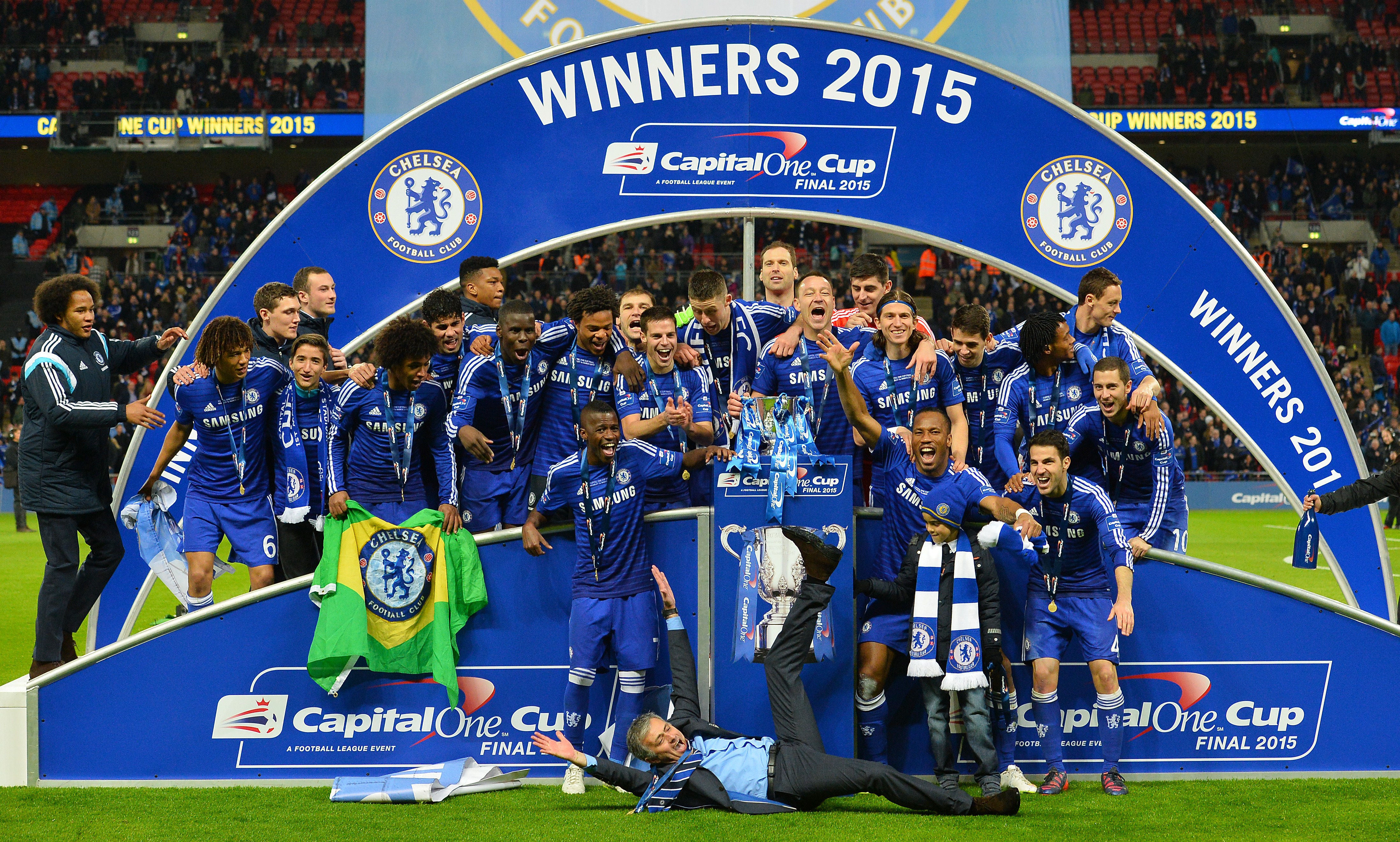 Chelsea players and manager Jose Mourinho celebrate their League Cup final win over Tottenham in March 2015.