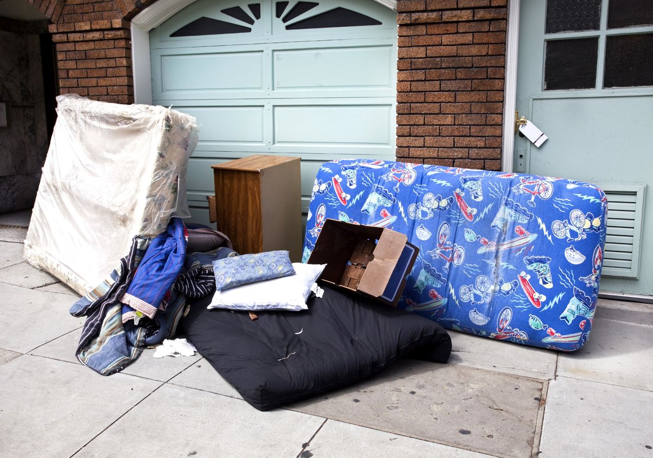 Belongings outside of a house.