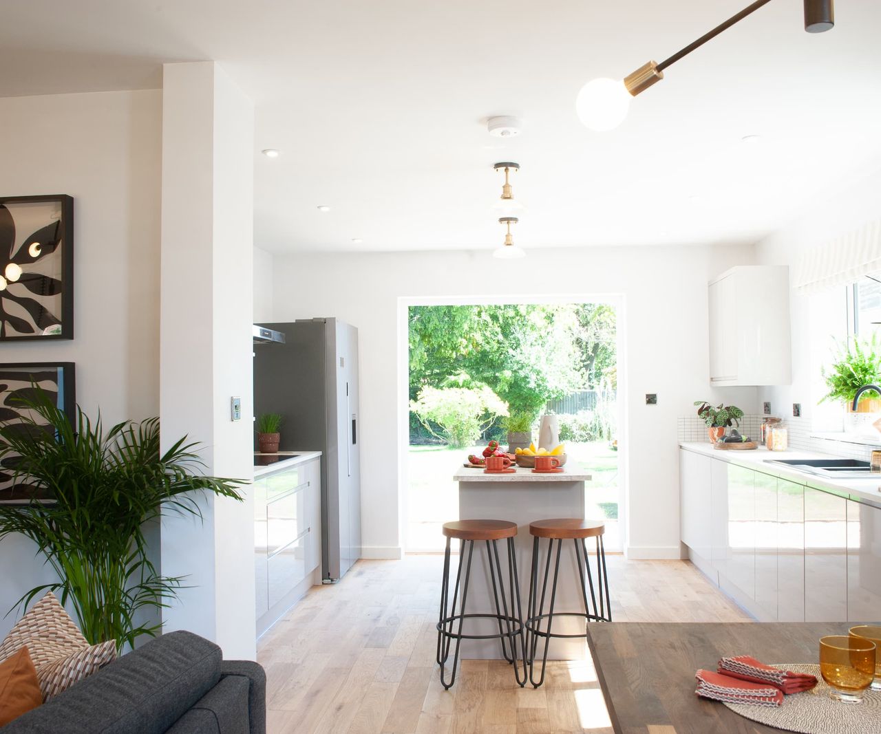 French doors lead from the kitchen-dining area to the outside decking