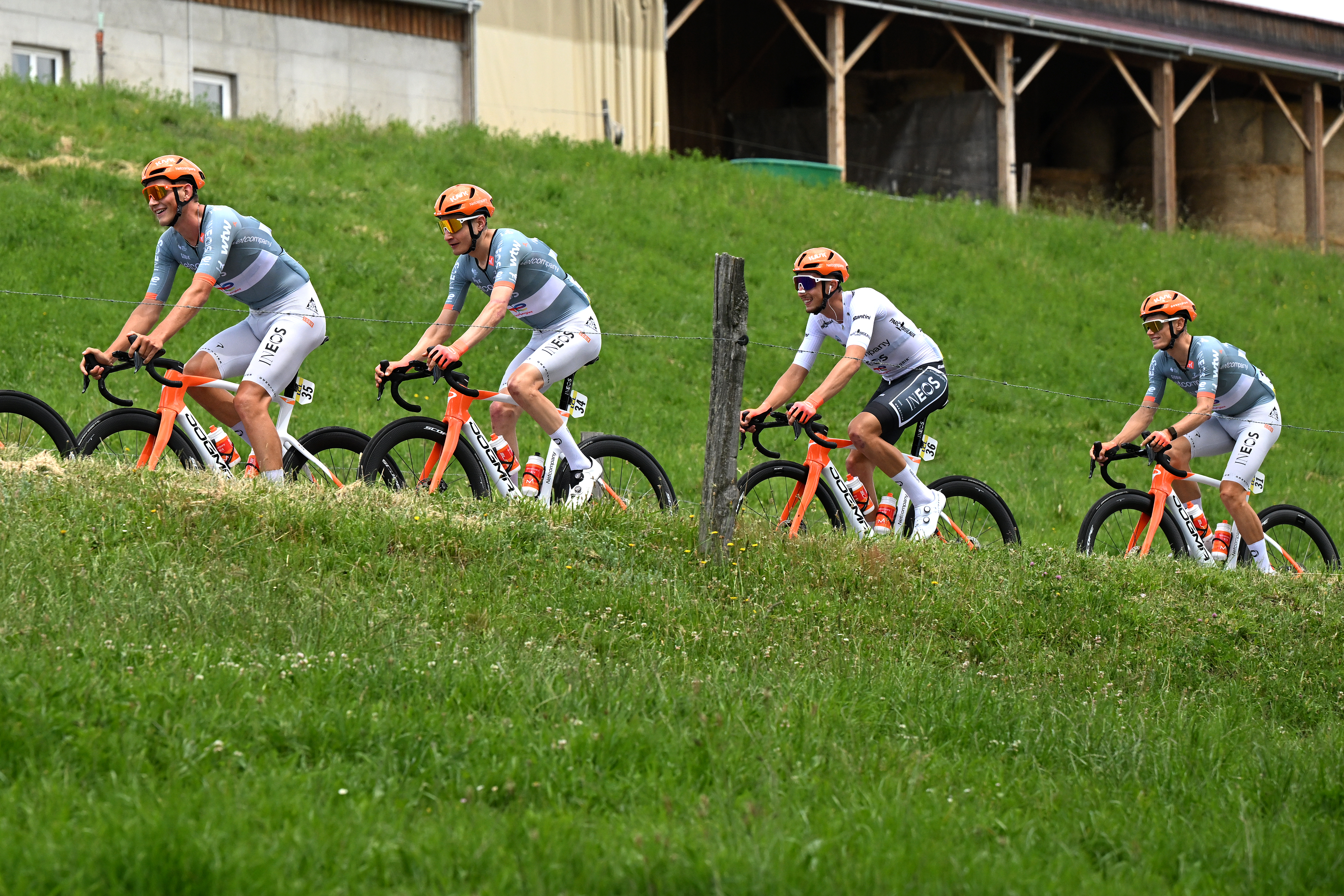 VILLARS-LES-DOMBES, FRANCE - JUNE 11: (L-R) Carlos Rodriguez of Spain, Kevin Vauquelin of France and Netcompany INEOS Cycling Team - White Best Young Rider Jersey and a general view of the peloton competing during the 78th Tour Auvergne-Rhone-Alpes 2026, Stage 5 a 195.8km stage from Saint-Chamond to Parc des Oiseaux Villars-les-Dombes / #UCIWT / on June 11, 2026 in Parc des Oiseaux Villars-les-Dombes, France. (Photo by Dario Belingheri/Getty Images)