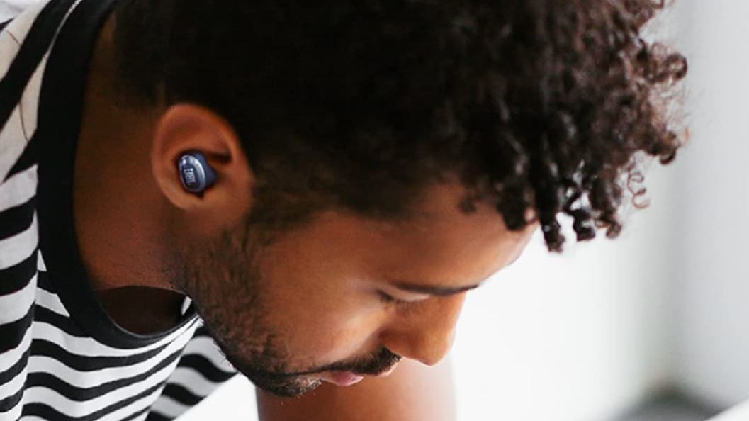 JBL Live Free wireless earbuds being worn