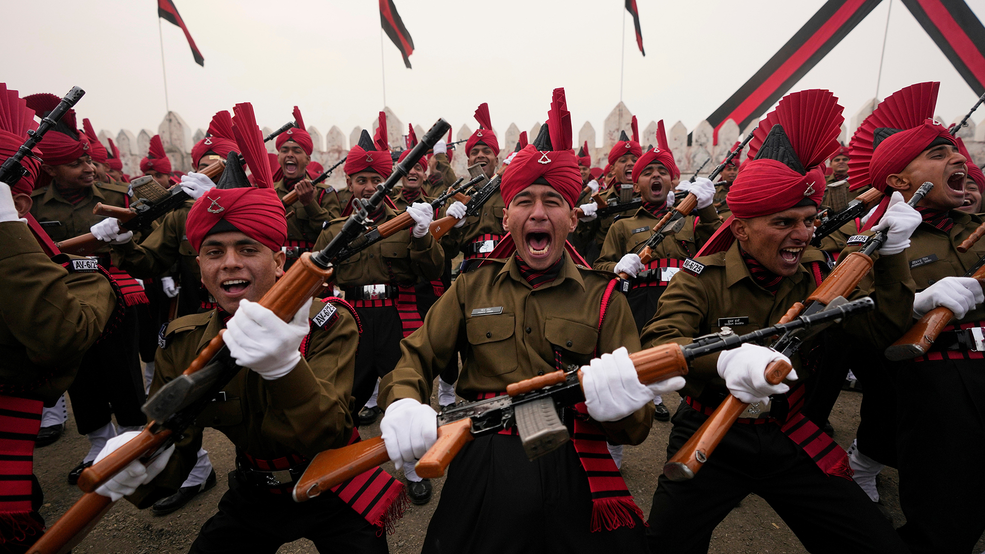 Soldiers of the Jammu and Kashmir Light Infantry (JKLI) celebrate during a graduation parade in Srinagar, Indian-controlled Kashmir