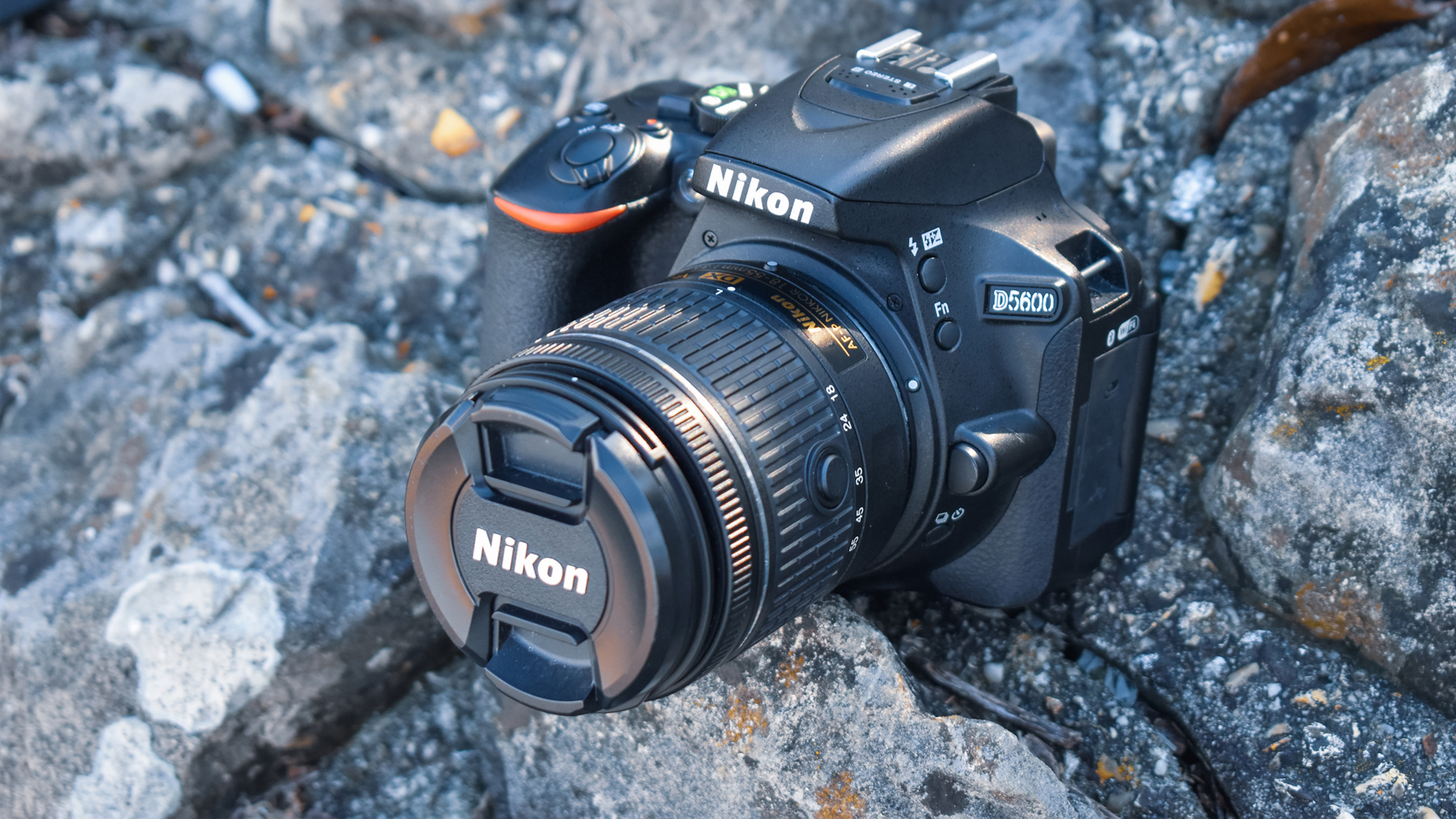 Nikon D5600 camera rests on the rocks