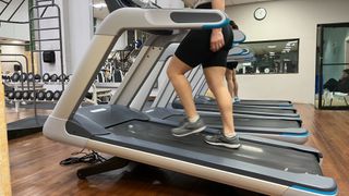 Madeline Muzzi on a treadmill doing an incline walk