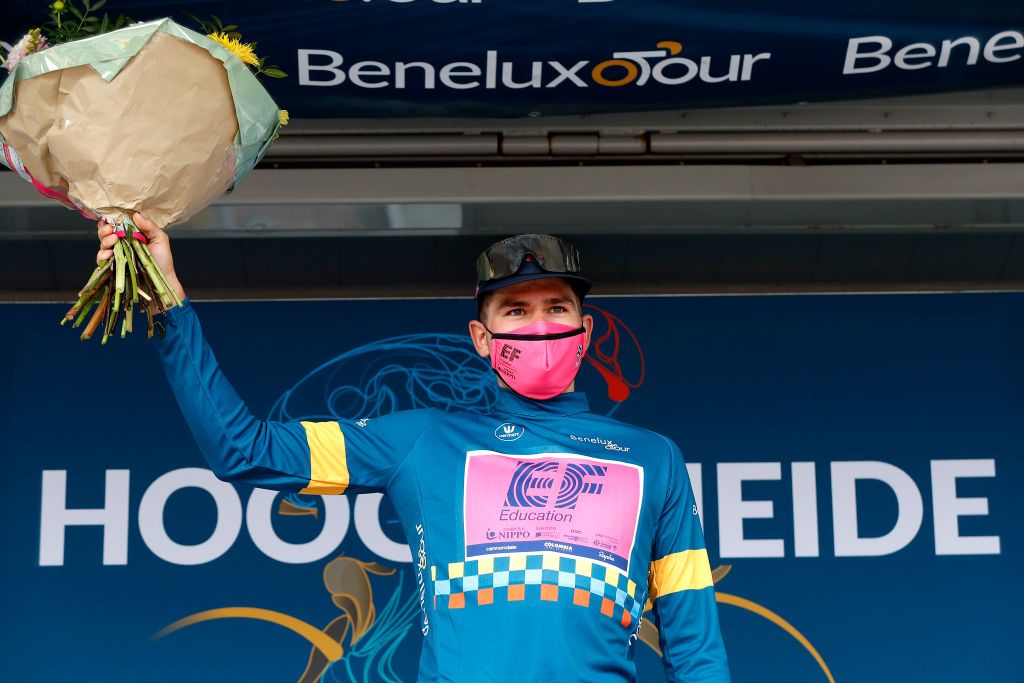 HOOGERHEIDE NETHERLANDS SEPTEMBER 01 Stefan Bissegger of Switzerland and Team EF Education Nippo celebrates winning the Blue Leader Jersey on the podium ceremony after the 17th Benelux Tour 2021 Stage 3 a 1683km stage from Essen to Hoogerheide BeneluxTour on September 01 2021 in Hoogerheide Netherlands Photo by Bas CzerwinskiGetty Images