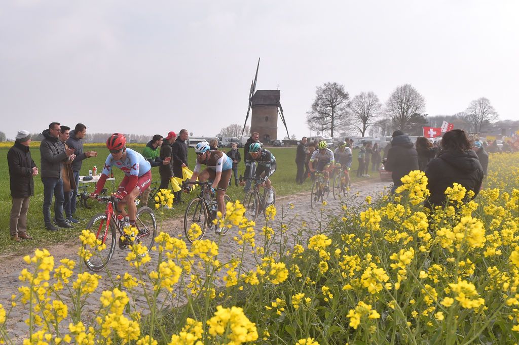ROUBAIX FRANCE APRIL 14 Mads Wurtz Schmidt of Denmark and Team KatushaAlpecin Nico Denz of Germany and Team AG2R La Mondiale Peloton Windmill Landscape Cobblestones Fans Public during the 117th ParisRoubaix a 257km race from Compigne to Roubaix ParisRoubaix ParisRoubaix PRBX LEnfer du Nord on April 14 2019 in Roubaix France Photo by Luc ClaessenGetty Images
