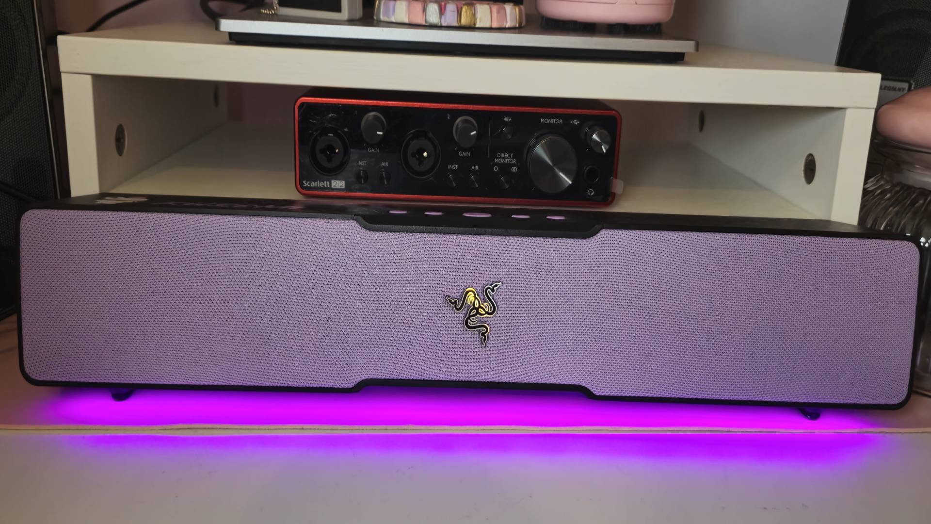 Photo taken by writer Rosalie Newcombe of the Razer Leviathan V2 X Kuromi Edition sound bar., sitting on a white desk.