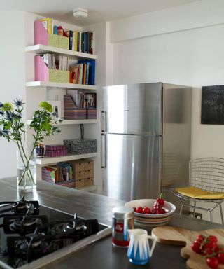 modern kitchen with stainless steel fridge