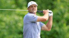 Bryson DeChambeau takes a shot at the 2023 PGA Championship at Oak Hill Country Club
