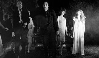Night of the Living Dead zombies shambling towards the camera