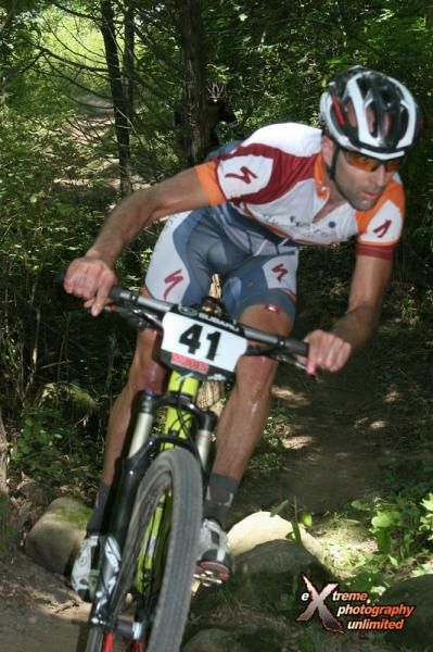 Mike Phillips (Adventure 212/Specialized) rode to a third place finish in the heat and mud at the Battle of Cam Rock. Photo by Extreme Photography.