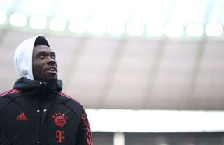 Bayern Munich's Canadian midfielder Alphonso Davies enters the pitch ahead of the start of the German first division Bundesliga football match between Hertha Berlin and FC Bayern Munich in Berlin on November 5, 2022.