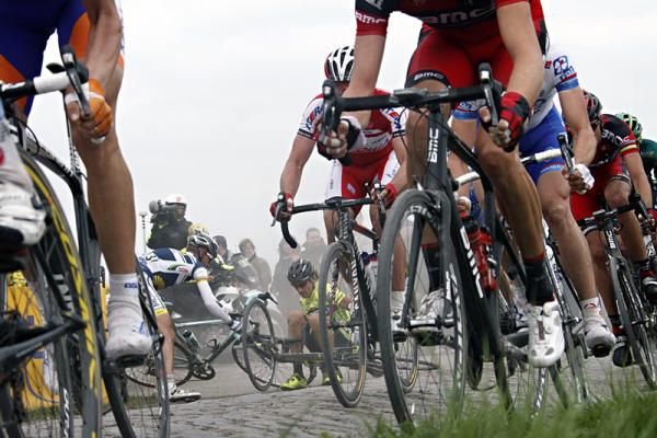 Stijn Devolder (Vacansoleil-DCM) and Filippo Pozzato (Farnese Vini-Selle Italia) crash out of contention at Paris-Roubaix.
