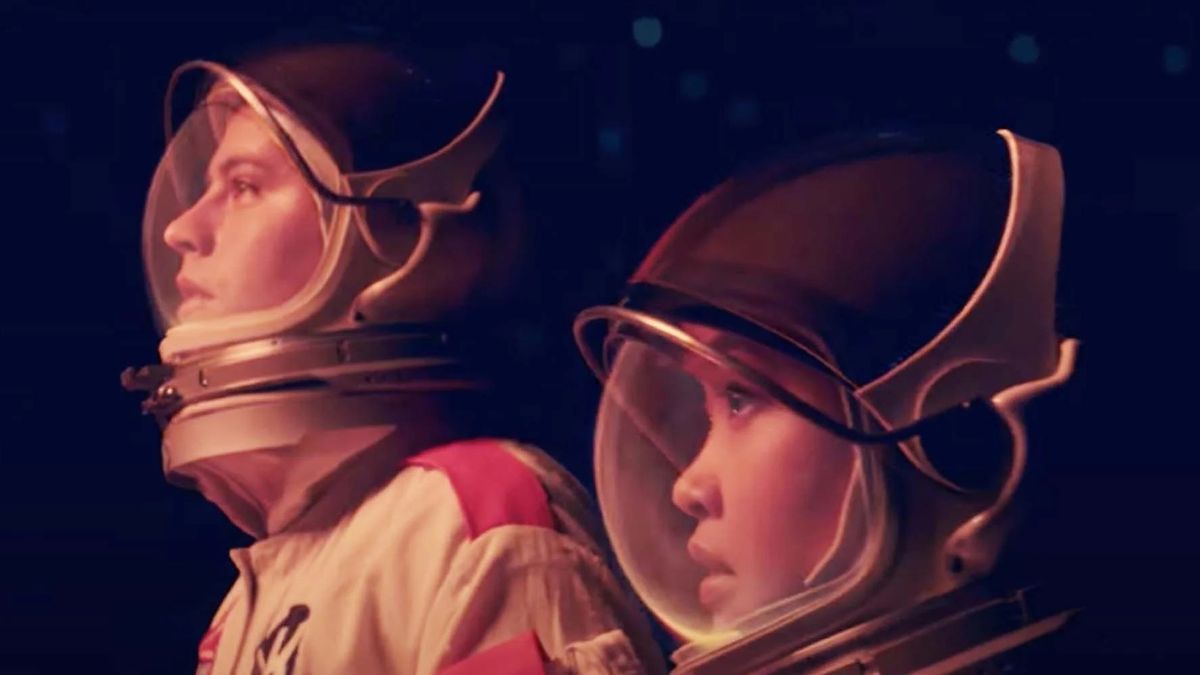 Cole Sprouse and Lana Condor with helmets in Moonshot