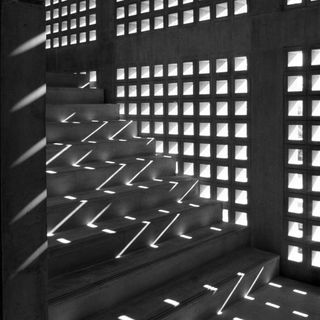 Photograph taken by Tadao Ando of stairs with sunlight on it