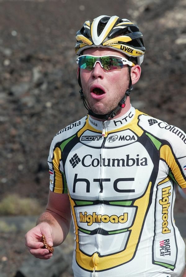 Mark Cavendish grabs a spot of lunch on the road.