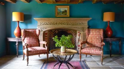 A colorful living room in a country home in Sussex designed by Kate Forman