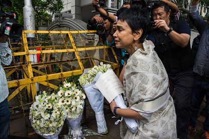 A woman mourns the attack in Dhaka, Bangladesh