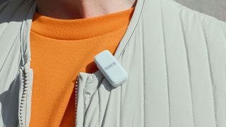 Rode Wireless Micro microphone attached to a jacket collar