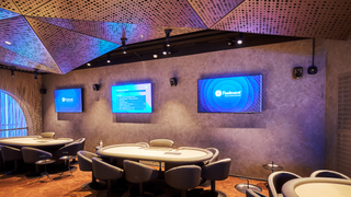 A poker/gaming room at Casino Tampere using Genelec solutions for responsible gaming.