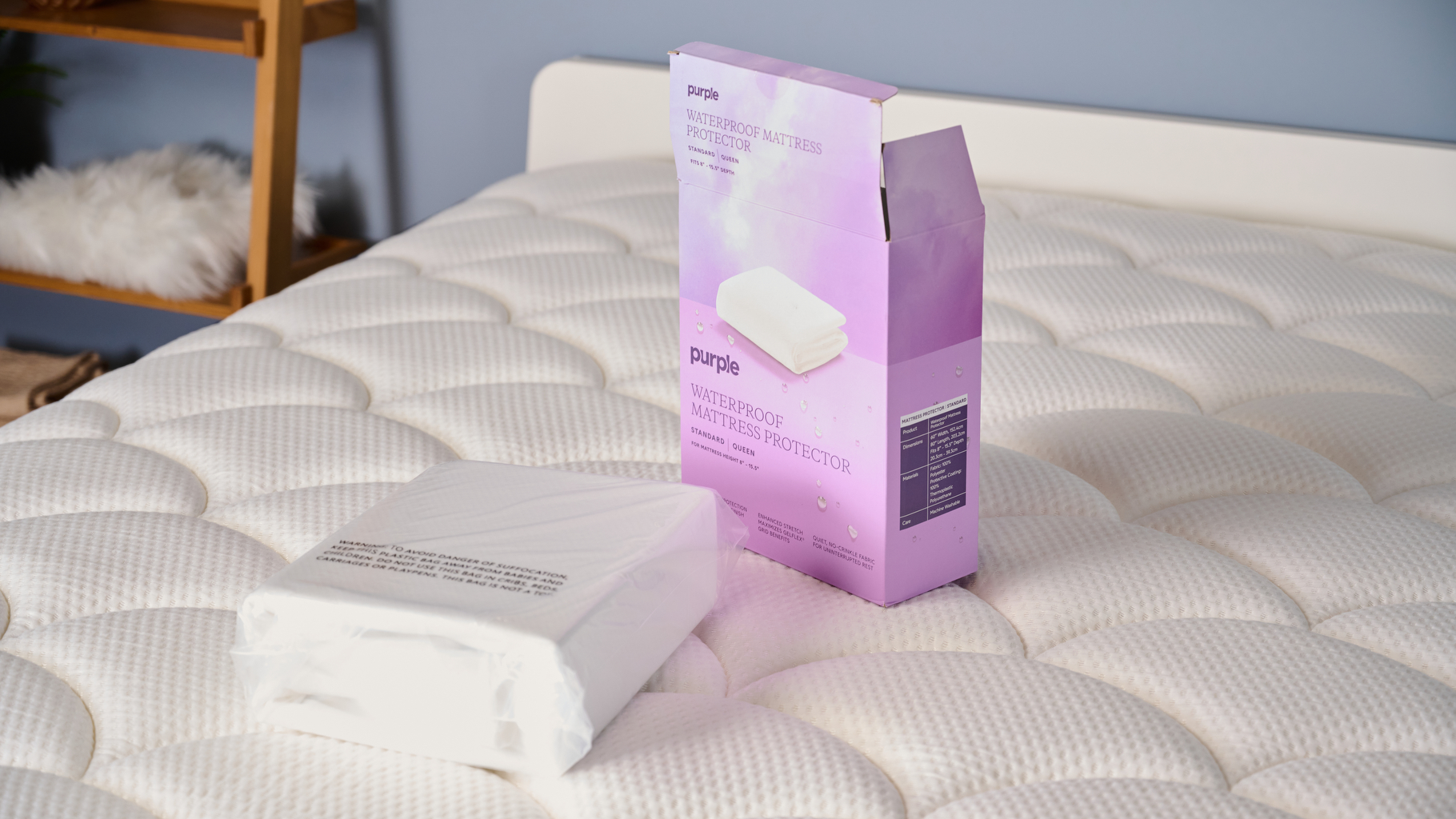 Purple Waterproof Mattress Protector opened up on the bed