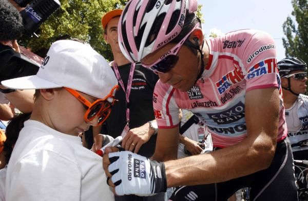 Alberto Contador (Saxo Bank-SunGard) signs an autograph ahead of stage 14 of the Giro d'Italia.