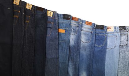 Overlapping denim jeans in a wide range of blue tones