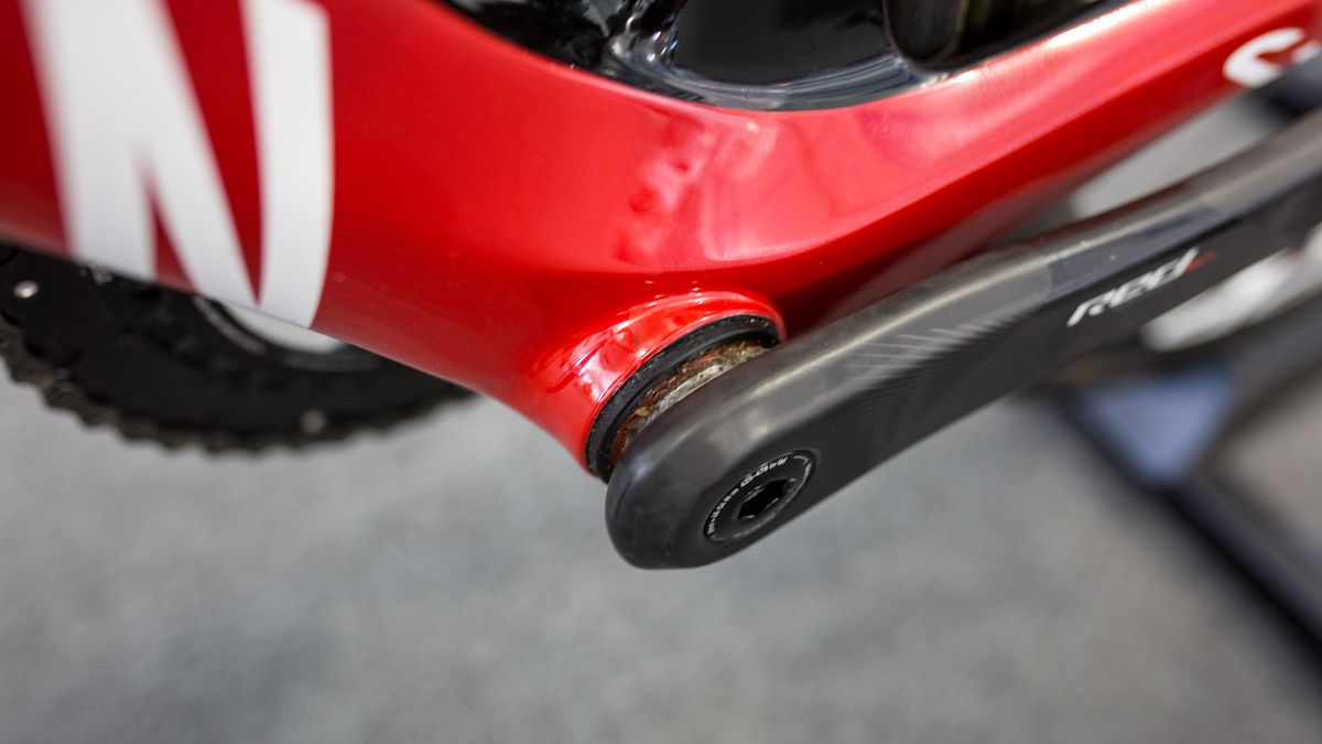The bottom bracket butts out of the frame slightly