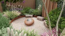 modern gravel garden with ornamental grass and flower beds, pebble-style table, wooden benches, tree and wooden fence