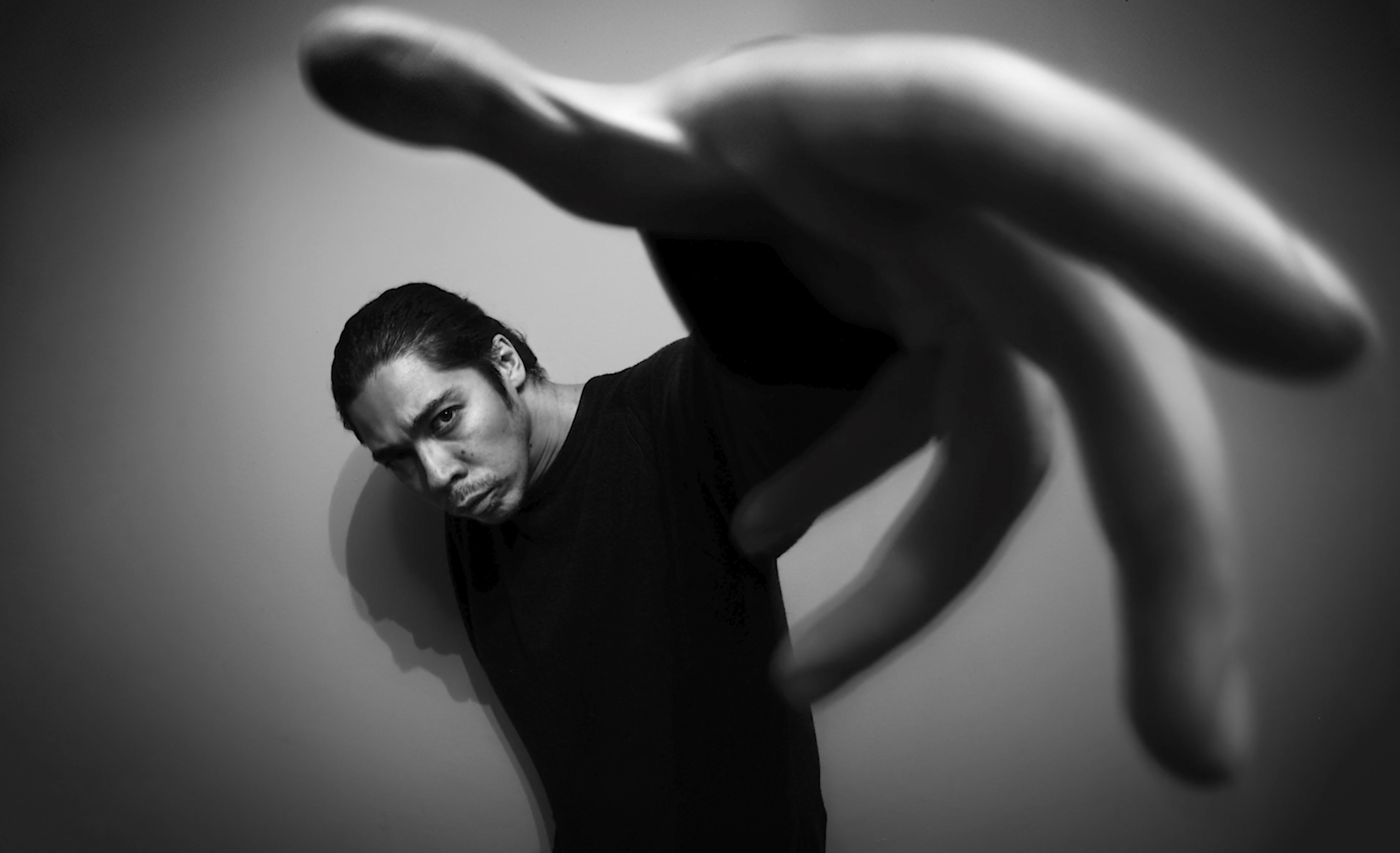 Black-and-white fisheye lens portrait of James Artaius
