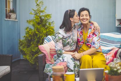 Mother and daughter embracing each other