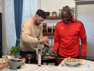 Linford Christie lends a hand in Alex's B&B by the Sea kitchen.
