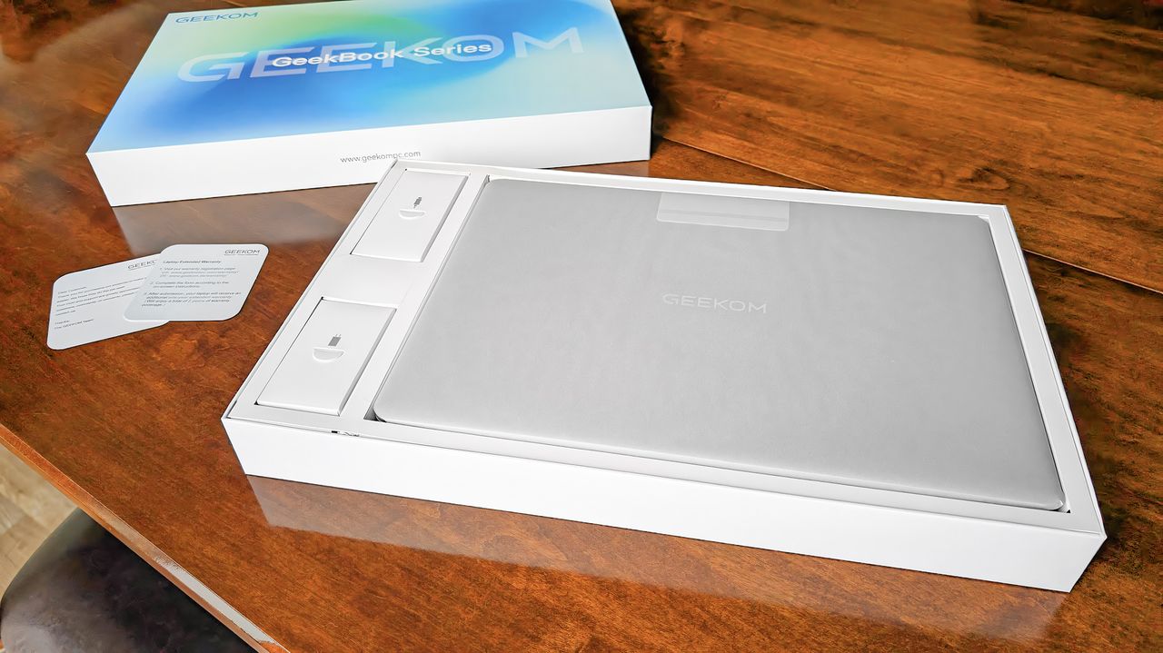 Geekom GeekBook X16 Pro in its box but with the lid uncovered.