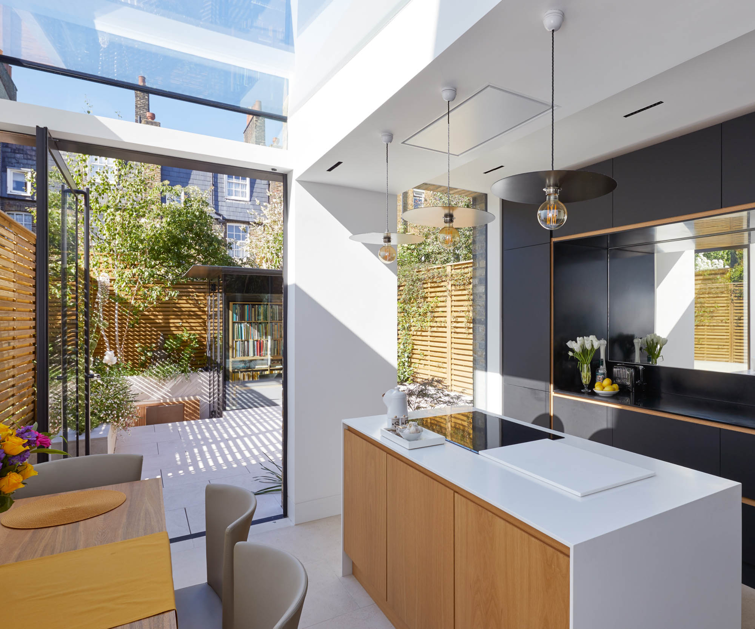 inside small house extension ideas with kitchen and glazed roof section