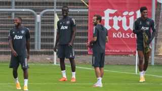 COLOGNE, GERMANY - AUGUST 15: (L-R) Fred, Eric Bailly, Juan Mata and Marcus Rashford of Manchester United laugh during a training session at RheinEnergieStadion on August 15, 2020 in Cologne, Germany.