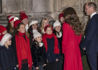 Kate Middleton hosts carol concert at Westminster Abby.