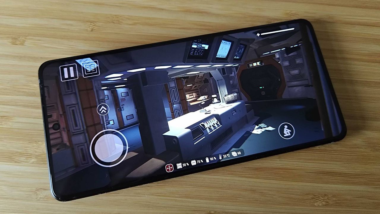 Asus ROG Phone 9 Pro with Aline Isolation gameplay on screen