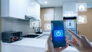 Person using smartphone app to control various smart home devices 