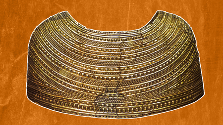 a gold cape-like accessory against an orange background