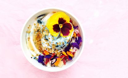 Kokus dairy-free ice cream bowl, topped with edible flowers