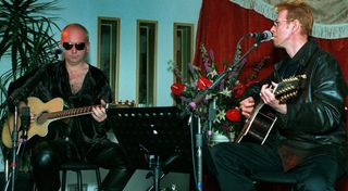 Reeves Gabrels (left) and David Bowie perform at Fort Apache in Cambridge, Massachusetts on April 8, 1997