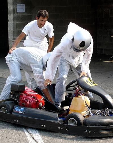 Soigneur Josep lends another team a helping hand during the changing of drivers