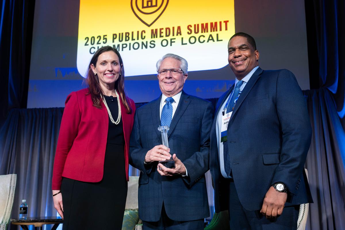 Larry Unger (Center) receiving the 2025 Pillar of Public Service Award.