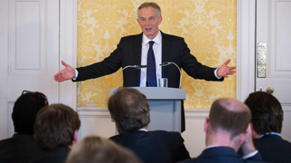 Tony Blair speaks to journalists at a press conference