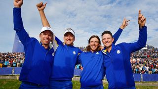 Paul Casey, Ian Poulter, Tommy Fleetwood and Justin Rose, right, celebrate after Team Europe's 2018 Ryder Cup victory in France