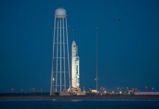 Orbital ATK's first Antares rocket since a 2014 accident stands atop its Pad-0A launchpad at NASA's Wallops Flight Facility on Wallops Island, Virginia on Oct. 15, 2016. The rocket is set to launch a Cygnus cargo ship filled with NASA cargo on Oct. 16.